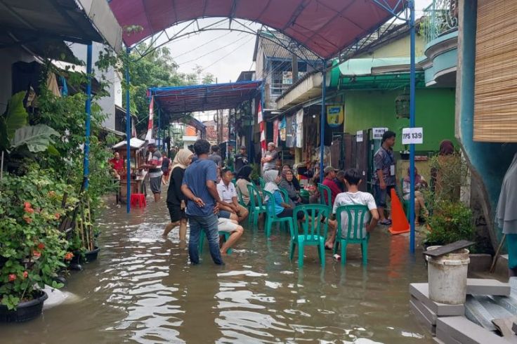 Warga di DKI Tetap Nyoblos di Tengah Banjir