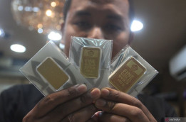 Harga Emas Antam Meroket Rp1,327 Juta Per Gram