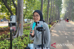 Kawasan  Kanal Banjir Timur Jadi Ruang Baru Bagi "live Streamer" Rain Cuan