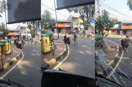 Menanti Pelempar Bus Tranjakarta Tertunduk Lesu Diapit Polisi Pakai Baju ”Shopee”