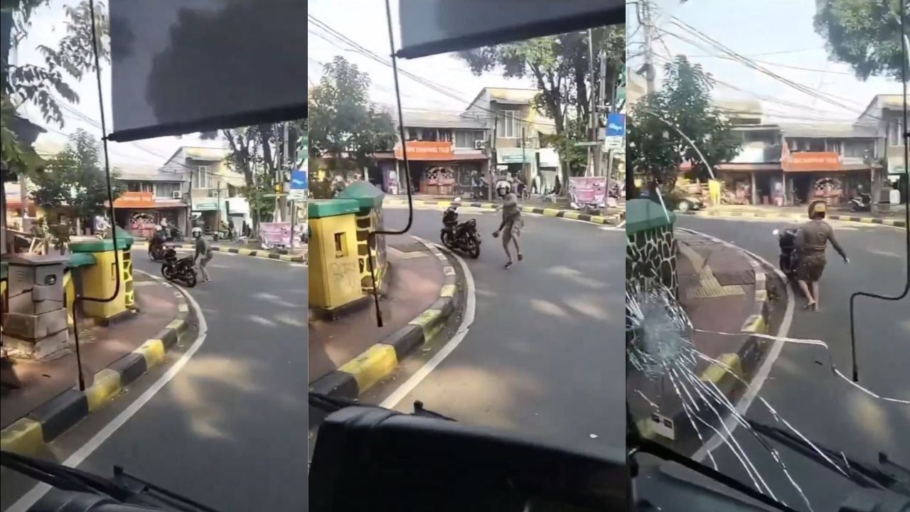 Menanti Pelempar Bus Tranjakarta Tertunduk Lesu Diapit Polisi Pakai Baju ”Shopee”